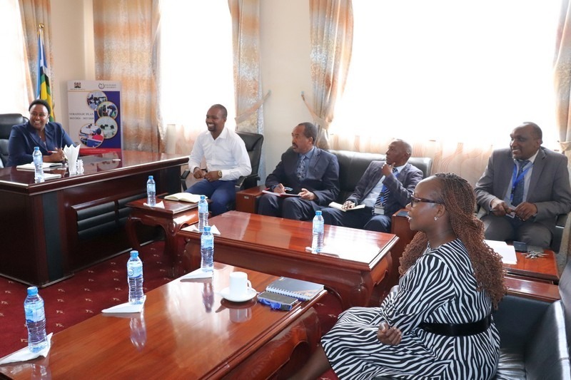 Machakos University staff welcome Ms. Helen Muthoni, a representative from Equity Bank